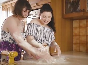 Busty hairy lesbian Luci Q and curvy cutie Astrid Love fuck in the kitchen