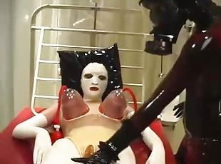 Heavy rubber suction treatment with big tits in clinic room - femdom gasmask mistress and her slave