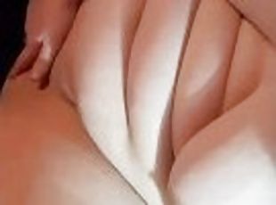 In bed fully nude, fingering myself then licking cum off fingers, I came too!