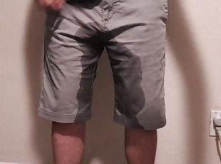 super desperate guy wets shorts