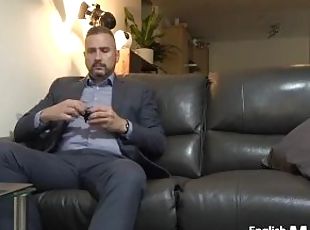 Solo businessman in suit masturbates uncircumcised penis and cums w...