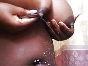 Kenyan milf  doing Milk Fireworks with her big sexy tits