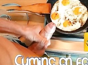 Big dick is cuming on his breakfast, adding some deliciousy ????????