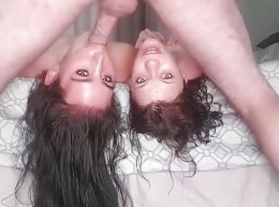 2 sluts getting throated by one lucky cock while laying upside down...