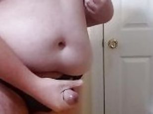 Chubby bottom strips and cums hard