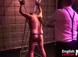 Suited Dom flogs slave on St Andrew’s Cross with two whips PREVIEW