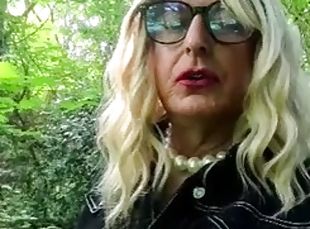 Amateur crossdresser Kellycd2022 sexy milf out in the woods in whit...
