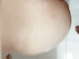 Quickie in gym shower, shot load on my ass and slid down to my puss...