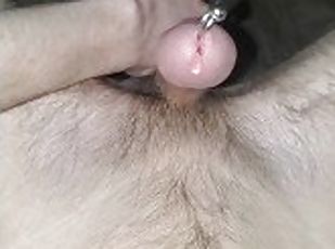 Cumming by touching and tugging balls