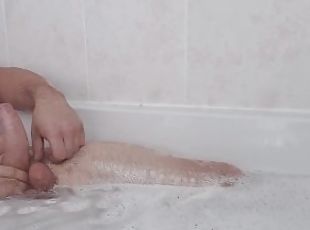 Chubby guy foreskin and balls bathtime play after oily day in garage