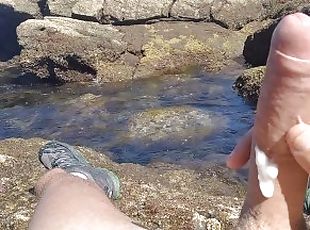 Jerking off a Big Hard Dick overlooking the sea in the Public cove ...