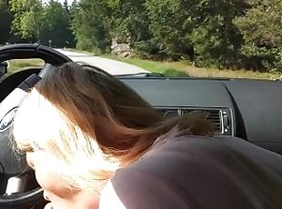 Milf sucking dick on the parking by the public road. Public sock sucking and cumshot