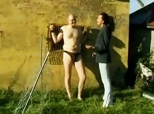 Filthy Slut Tied Poor Guy And Jerks His Cock Outdoors