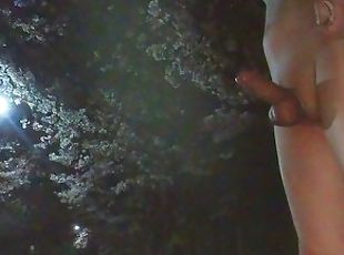 With naked erection walking under cherry trees at midnight and play...