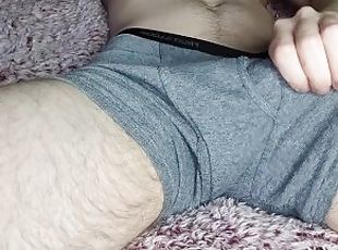 Sexy guy strokes big white cock in underwear until he starts precum...