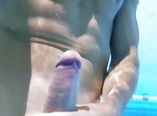 Risky underwater masturbation in a public swimming pool