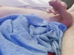 Young guy relaxing himself with a nice orgasm after stroking his bi...