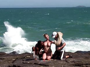 Dirty Blonde Whore Slurps On Two Dicks At The Beach