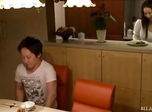 Experienced Japanese chick provides her partner with a nice titjob