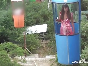 Naughty brunette Milf in public outdoor flashing on funicular
