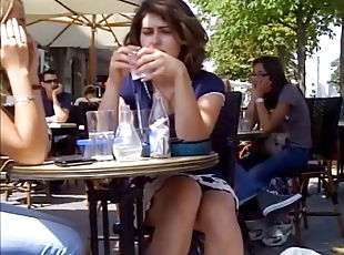 Brunette in a summer caf teasing