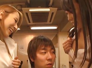 One guy gets his stiff dick pleasure by two Japanese hotties