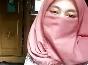 Hijab Muslim girl undressing