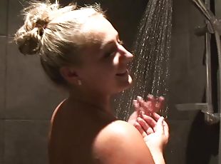 Horny blonde babe with big tits lets her man record how she is wash...