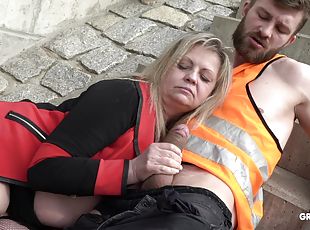 Construction workers pound a mature blonde slut outdoors