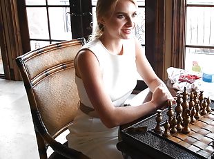Amateur blonde babe Angelina exposes herself while playing chess