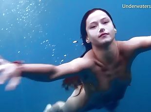 Hot erotica in the sea with 3 girls