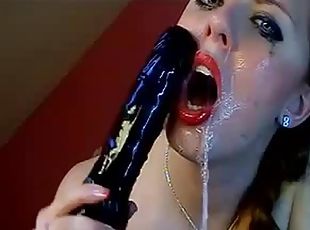 Aurelie likes to gag herself with her big dildo