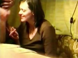 Brunette milf giving some guy head without any idea she is being fi...