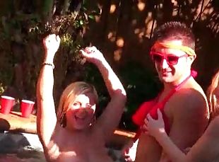 Hot blonde gets pussy pounded at a pool sex party