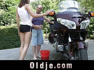 A much older guy gets to bang a teen slut by his motorcycle