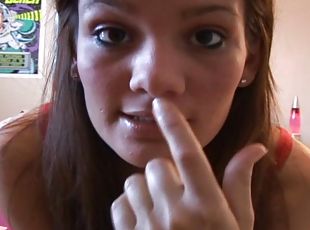 Nadia fingers her smooth pussy in front of a webcam