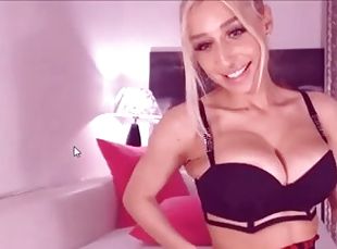 Big-breasted blond bombshell gives a webcam performance