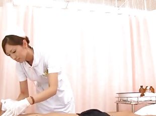 Pretty Japanese nurse Yuri Kasiwa cures a guy with the help of a ha...