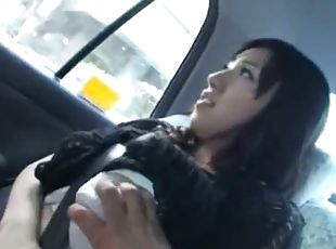 Sexy Asian Babe Showing Her Tits In The Car