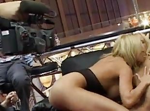 Arousing lesbian blonde with big tits hammering her partner doggyst...