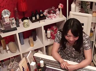 Aggressive masseuse is all over her Japanese pussy