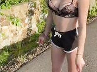 Beautifull teen in bra smoking and spitting loogies while roller sk...