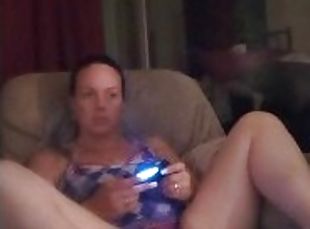 Filming Up Milf's Purple Mini Skirt While She Plays Video Games