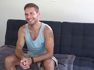 Athletic solo jock David Skyler strokes cock after interview