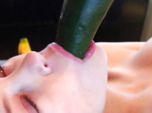 Frisky nympho fucks herself with a cucumber
