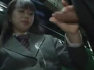 Schoolgirl gives handjob on a bus