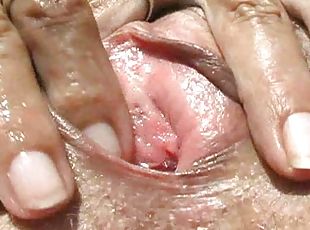 Close up of hairy mature pussy fingered
