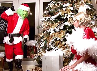 Kelly Madison fucked by a Grinch in front of a Christmast tree