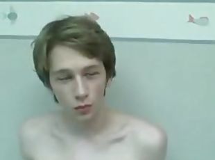 Twink lubes his cock and jerks off solo