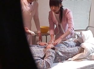 Spy cam catches two Japanese nurses pleasuring a horny patient